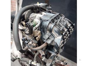 Engine from a Daihatsu Cuore (L251/271/276) 1.0 12V DVVT 2005
