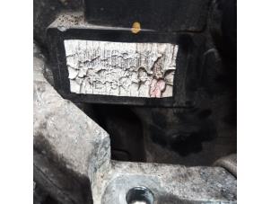 Engine from a Daihatsu Cuore (L251/271/276) 1.0 12V DVVT 2005