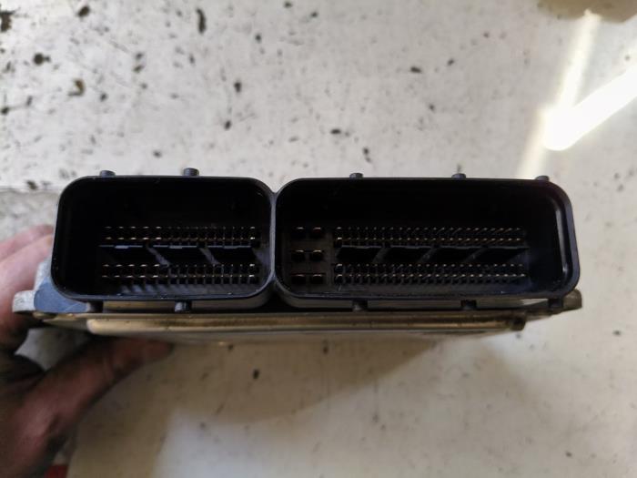 Engine management computer from a Audi A3 Sportback (8PA) 1.4 TFSI 16V 2009