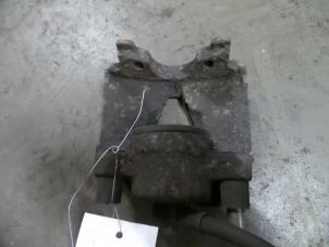 Used Front brake calliper, left Opel Astra F (56/57) 1.6i 16V Price on request offered by Autodemontage Joko B.V.