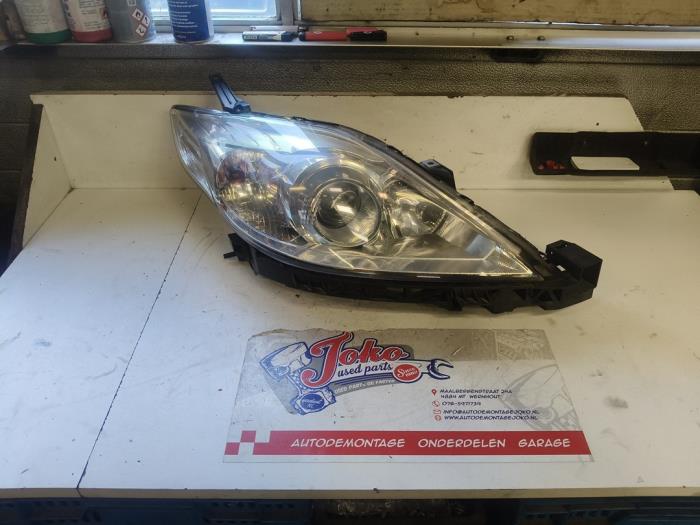 Używane Reflektor prawy Mazda 5 (CR19) Cena na żądanie oferowane przez Autodemontage Joko B.V.