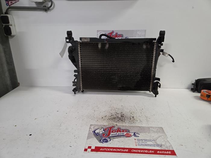 Used Radiator Opel Corsa D 1.2 16V Price on request offered by Autodemontage Joko B.V.
