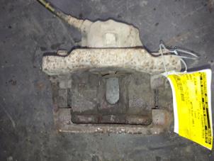 Used Front brake calliper, left Renault Espace (JE) 2.2 dT 12V Price on request offered by Autodemontage Joko B.V.