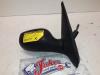Wing mirror, right from a Renault Clio II (BB/CB) 1.2 2000