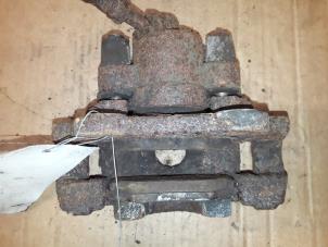 Used Rear brake calliper, left BMW 3 serie Touring (E46/3) 318d 16V Price on request offered by Autodemontage Joko B.V.