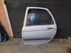 Używane Drzwi lewe tylne wersja 4-drzwiowa Citroen Xsara Picasso (CH) 2.0 HDi 90 Cena na żądanie oferowane przez Autodemontage Joko B.V.