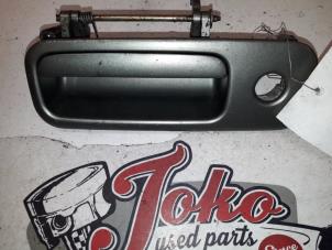 Used Tailgate handle Volkswagen Lupo (6X1) 1.4 60 Price on request offered by Autodemontage Joko B.V.