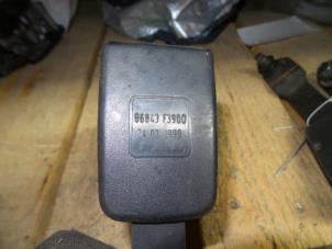 Used Front seatbelt buckle, left Nissan Cabstar (F22) 3.0 TDI E-100 Price on request offered by Autodemontage Joko B.V.
