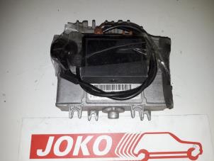 Engine management computer from a Seat Arosa (6H1) 1.0 MPi 1997