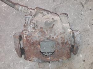 Used Front brake calliper, right Ford Courier (J3/5) 1.8 D Price on request offered by Autodemontage Joko B.V.