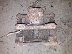 Used Front brake calliper, right Renault Clio III (BR/CR) 1.2 16V 65 Price on request offered by Autodemontage Joko B.V.