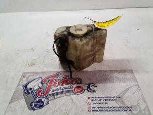 Used Front windscreen washer reservoir Opel Corsa A 1.3 N (euronorm) Price on request offered by Autodemontage Joko B.V.
