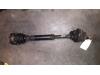 Front drive shaft, left from a Audi A4 1996