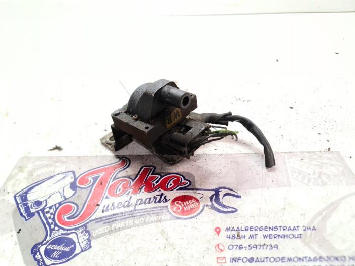 Ignition coil from a Opel Corsa A 1.4 i,Swing,City,GL,GT Kat. 1991