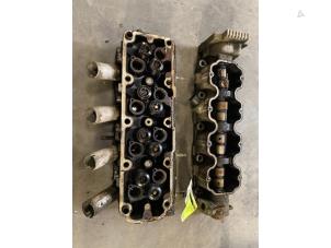 Used Cylinder head Opel Astra F (53/54/58/59) 1.6i Price on request offered by Autodemontage Joko B.V.