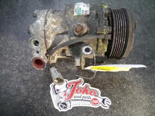 Used Air conditioning pump Opel Astra G Caravan (F35) 2.0 DTi 16V Price on request offered by Autodemontage Joko B.V.