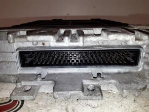 Engine management computer from a Volkswagen Golf III (1H1) 1.9 TDI 1995