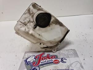 Used Front windscreen washer reservoir Toyota Corolla (EB/WZ/CD) 1.4 16V VVT-i Price on request offered by Autodemontage Joko B.V.