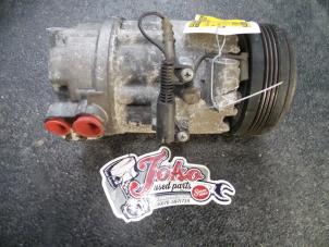 Used Air conditioning pump BMW 3 serie (E46/4) 318d 16V Price on request offered by Autodemontage Joko B.V.