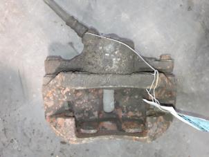 Used Front brake calliper, left Renault Kangoo Express (FC) 1.2 Price on request offered by Autodemontage Joko B.V.