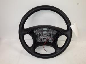 Used Steering wheel Peugeot Partner Combispace 1.4 Price on request offered by Autodemontage Joko B.V.