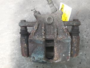 Used Front brake calliper, right Renault Clio III (BR/CR) 1.5 dCi 70 Price on request offered by Autodemontage Joko B.V.