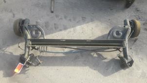 Used Rear-wheel drive axle Renault Clio III (BR/CR) 1.5 dCi 70 Price on request offered by Autodemontage Joko B.V.