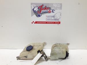 Used Front windscreen washer reservoir Peugeot 205 II (20A/C) 1.4 Price on request offered by Autodemontage Joko B.V.