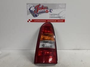 Used Taillight, left Opel Astra G Caravan (F35) 1.7 DTI 16V Eco4 Price on request offered by Autodemontage Joko B.V.