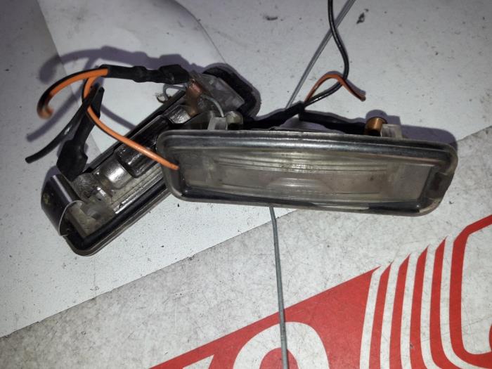 Registration plate light from a Ford Focus 1 1.6 16V 1998