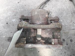 Used Front brake calliper, right Renault Clio III (BR/CR) 1.5 dCi 85 Price on request offered by Autodemontage Joko B.V.