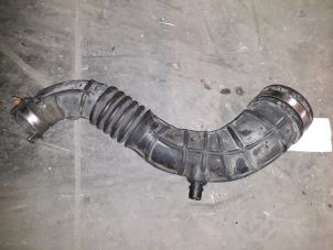 Used Air intake hose Renault Clio III (BR/CR) 1.5 dCi 85 Price on request offered by Autodemontage Joko B.V.