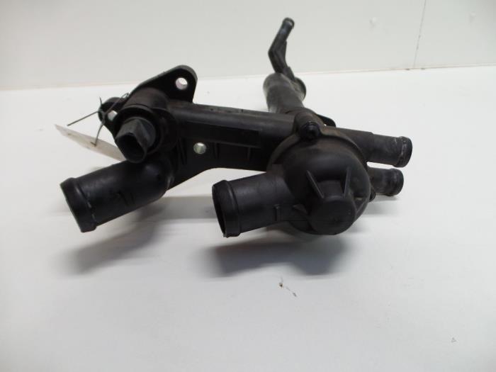 Thermostat housing from a Volkswagen Polo V (6R) 1.2 12V BlueMotion Technology 2011