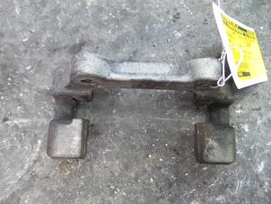 Used Rear brake calliperholder, left BMW 1 serie (F20) 114i 1.6 16V Price on request offered by Autodemontage Joko B.V.
