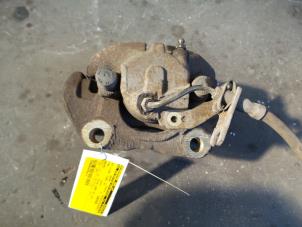 Used Front brake calliper, right Ford Galaxy (WGR) 1.9 TDI Price on request offered by Autodemontage Joko B.V.