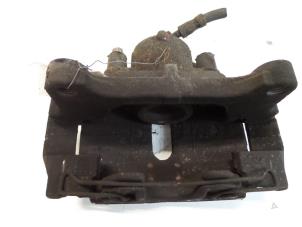 Used Front brake calliper, right Volkswagen Passat (3C2) 2.0 TDI 16V 140 Price on request offered by Autodemontage Joko B.V.