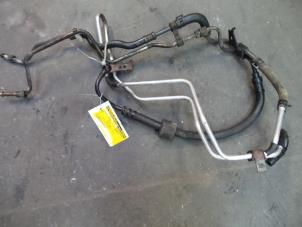 Used Power steering line Kia Rio (DC22/24) 1.5 16V Price on request offered by Autodemontage Joko B.V.