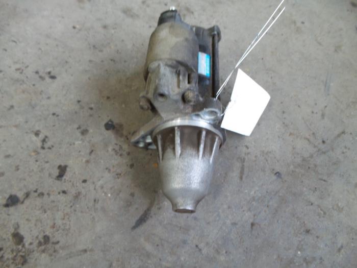 Used Starter Daihatsu Cuore (L251/271/276) 1.0 12V Price on request offered by Autodemontage Joko B.V.