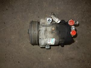 Used Air conditioning pump Opel Corsa C (F08/68) 1.3 CDTi 16V Price on request offered by Autodemontage Joko B.V.