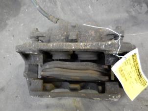 Used Front brake calliper, left Renault Espace (JE) 3.0i V6 24V Price on request offered by Autodemontage Joko B.V.