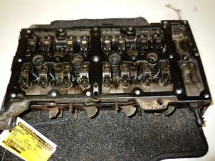 Used Cylinder head Opel Corsa C (F08/68) 1.3 CDTi 16V Price on request offered by Autodemontage Joko B.V.