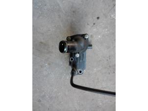 Used Thermostat housing Ford Mondeo IV 1.8 TDCi 125 16V Price on request offered by Autodemontage Joko B.V.