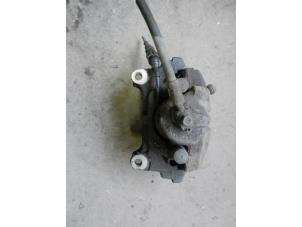 Used Front brake calliper, left Volkswagen Passat Variant (3C5) 1.9 TDI Price on request offered by Autodemontage Joko B.V.