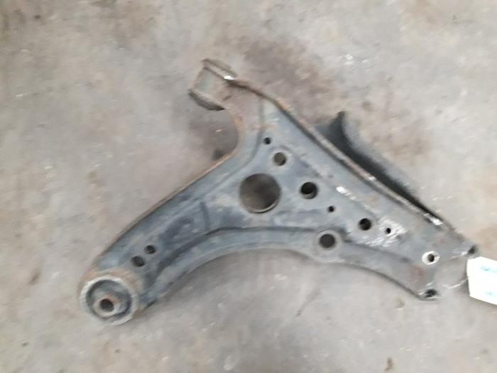 Front lower wishbone, left from a Volkswagen Polo 1997