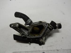 Used Thermostat housing Opel Astra H SW (L35) 1.7 CDTi 16V Price on request offered by Autodemontage Joko B.V.