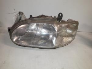 Used Headlight, left Ford Escort 6 (ANL) 1.6 Laser 16V Price on request offered by Autodemontage Joko B.V.