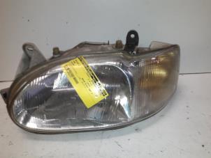 Used Headlight, left Ford Escort 6 (AAL/ABL) 1.6 16V Price on request offered by Autodemontage Joko B.V.