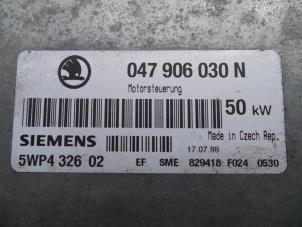 Engine management computer from a Skoda Felicia II (6U1) 1.3 1998
