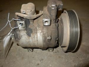 Used Air conditioning pump Ssang Yong Musso 2.9TD Price on request offered by Autodemontage Joko B.V.
