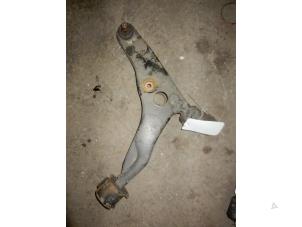 Used Front lower wishbone, left Mitsubishi Carisma 1.8 GDI 16V Price on request offered by Autodemontage Joko B.V.